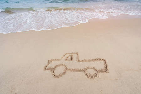Hand drawn image of a car in sandの写真素材