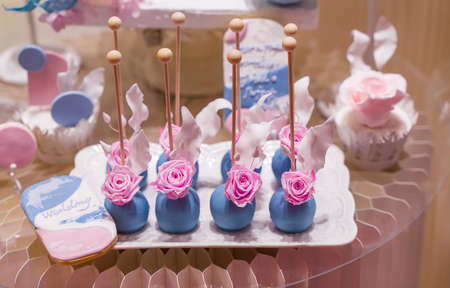 Wedding decoration with colorful cakes.