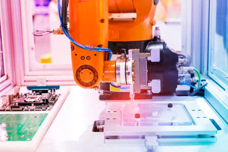 robot gripping and smart robot working on smart factory,industry 4.0 and technology.