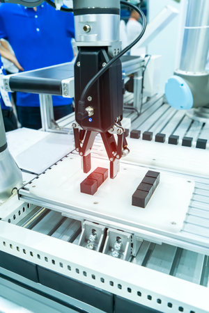 robot gripping and smart robot working on smart factory,industry 4.0 and technology.