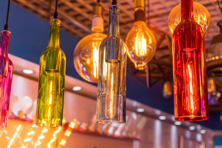 Decorative beer bottle style diode light bulb hang from ceilingの写真素材