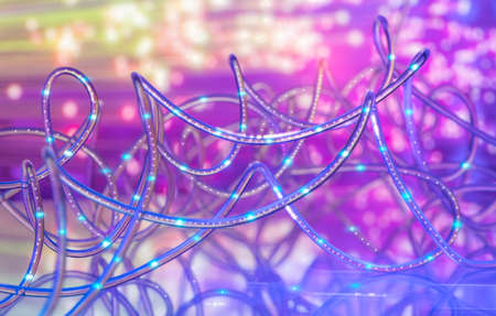 Fiber optics network cable on technology backgroundの写真素材