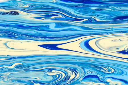 colorful flow of colors on canvas. Abstract background or texture. Acrylic Fluid Art