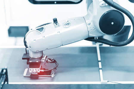 intelligence machine working in phone factoryの写真素材
