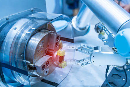 robot gripping and smart robot working on smart factory,industry 4.0 and technology.