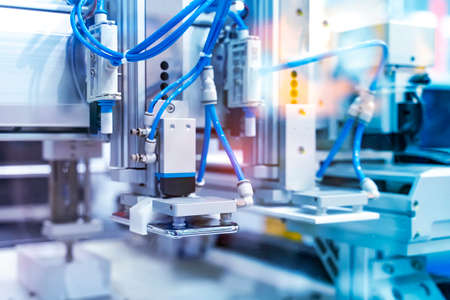 intelligence machine working in mobile phone factory,Smart factory industry 4.0 concept