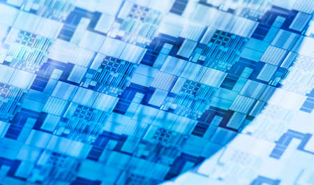 Silicon Wafers with microchips used in electronics for the fabrication of integrated circuitsの写真素材