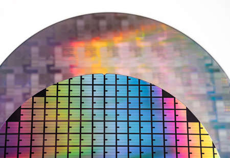 Silicon wafer with chips isolated on white background
