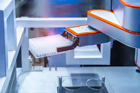 Robot arm with test tube for biological experiments in laboratory