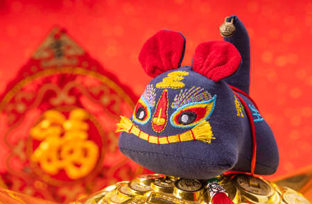 Tradition Chinese cloth doll tiger,2022 is year of the tiger,Chinese characters mean:good bless for new yearの写真素材