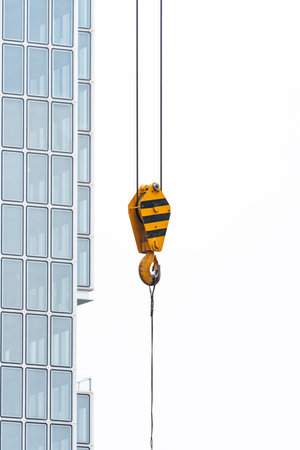 crane steel hook with cable isolated on white,Industrial equipment or tools.