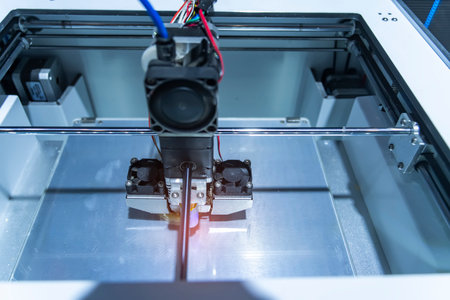 Three dimensional printing machine, 3D printer.