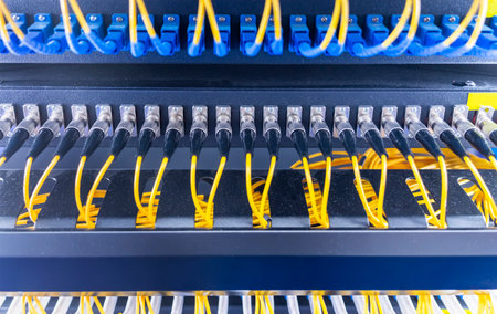 Fiber optic cable connect to communication distribution pointの写真素材