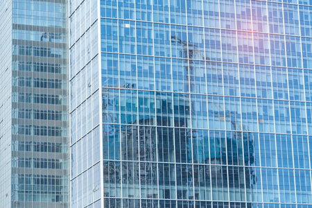 Contemporary office building blue glass wall detail