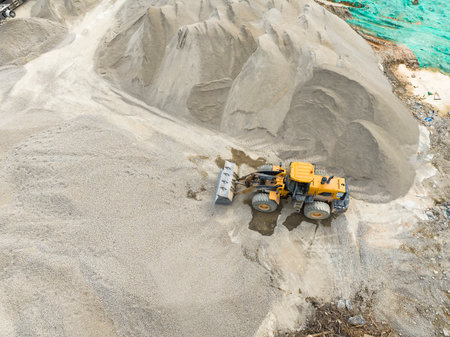 bulldozer on earthmoving at construction site, aerial view.の写真素材