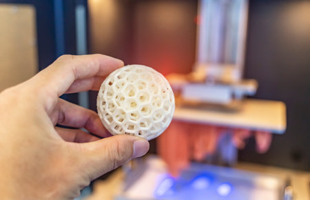hand with Object printed on 3d printer close-up