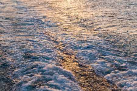 sea and waves caused by cruise shipの写真素材