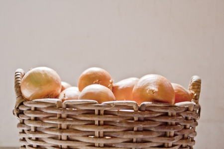 A basket full of onionsの写真素材