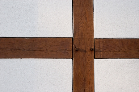 Wooden crossbars in wallの写真素材