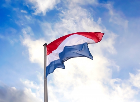 Flag of the Netherlands against the blue sky