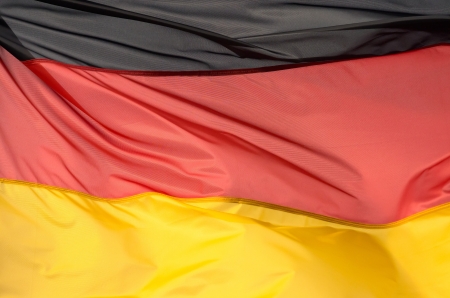 A fragment of the flag of Germany in the sunlightの写真素材