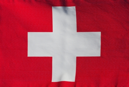Swiss flag in the wind close-upの写真素材
