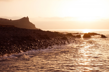 Sunrise on a sea shore in Madeiraの写真素材