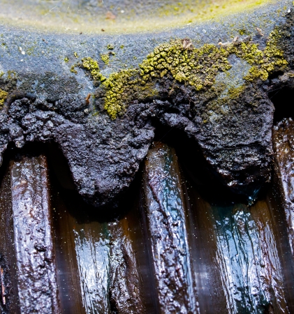   Fragment of old and rusty gear in the  sunlightの写真素材