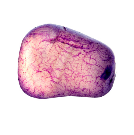 Purple gemstone on a white background