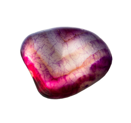Red gemstone on a white background
