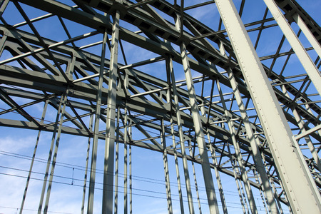Construction of a railway bridge against sky in the sunlight