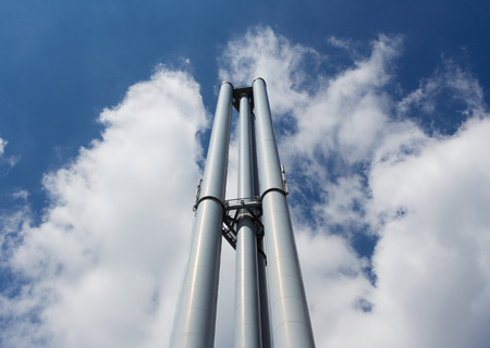 Factory  against the sky in the sunshineの写真素材