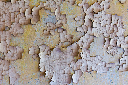 Old abandoned and cracked wall of a buildingの写真素材