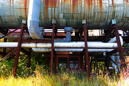Old factory and grass in the sunshineの写真素材