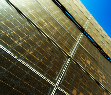 Old and dusty solar panel against the skyの写真素材