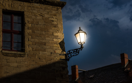 The old building against sky in city and glowing lantern .の写真素材