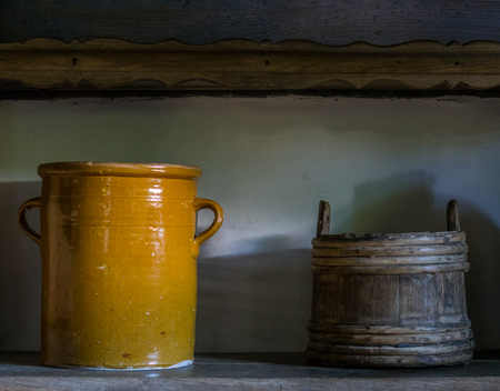 The old  wooden bucket in a farmhouse.の写真素材