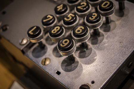 The old and vintage keyboard of a control panel.の写真素材