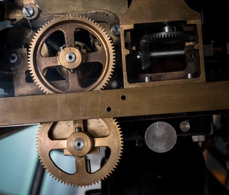 The mechanism of a old and vinage machine.