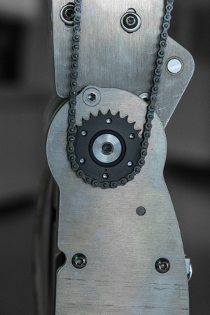 The mechanical and metal knee-joint of an android.