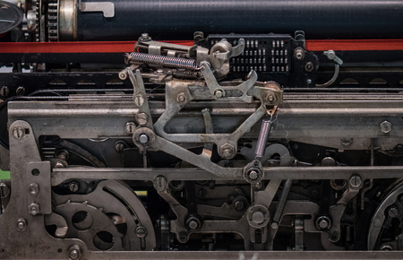 The mechanism of a old and vinage machine.