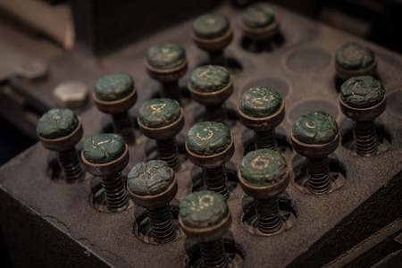 The old and vintage keyboard of a control panel.の写真素材