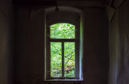 The old and ruined widow of a building, lost placesの写真素材