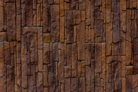 The background of an red stone wall.