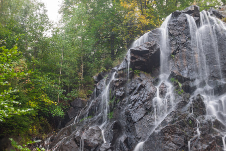The waterfall on mountains in Harz, Germany.