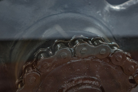 The old and vintage chain belt of a engine.の写真素材