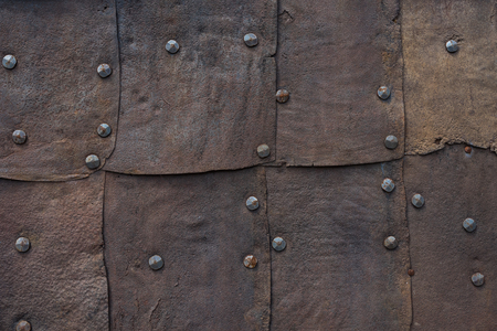 The old iron wall of a building .