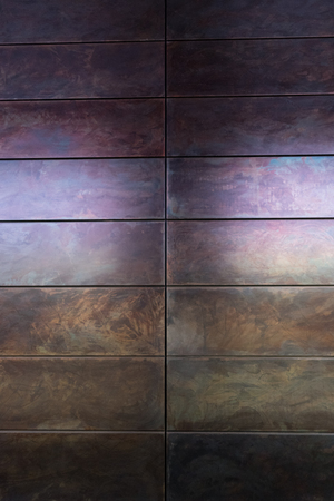 Background of a metal and multicolored wall .