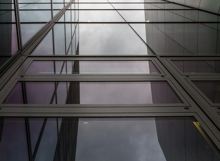 The glass architecture in city against a sky .の写真素材
