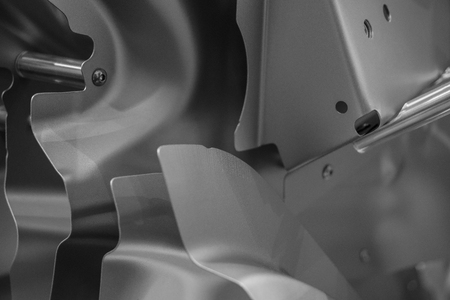 Metal parts of a car in automotive production .の写真素材